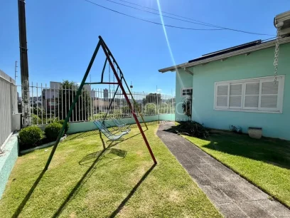 Casa com 4 Dormitórios - Miniatura - Lunardi Imóveis