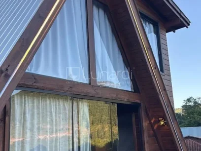 Casa em Condomínio com 1 Suíte - Miniatura - Lunardi Imóveis