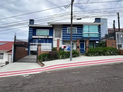 Casa com 4 Dormitórios - Lunardi Imóveis