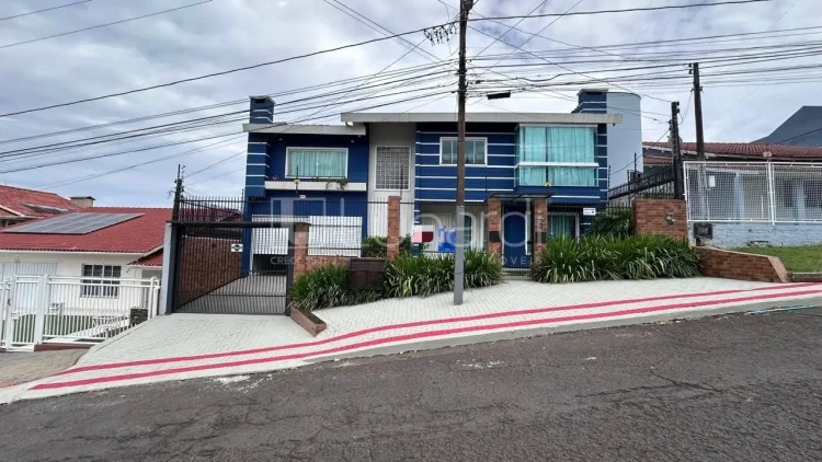 Casa com 4 Dormitórios - Lunardi Imóveis