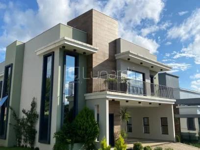 Casa com 4 Dormitórios - Lunardi Imóveis