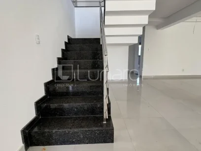 Casa com 4 Dormitórios - Miniatura - Lunardi Imóveis