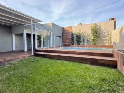 Casa com 4 Dormitórios - Lunardi Imóveis