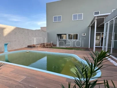 Casa com 4 Dormitórios - Miniatura - Lunardi Imóveis