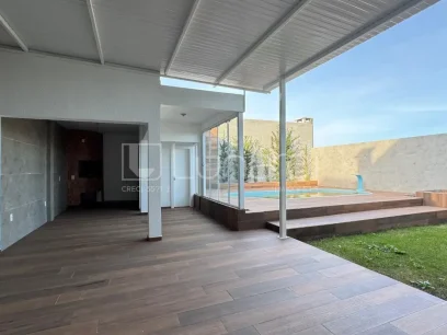Casa com 4 Dormitórios - Miniatura - Lunardi Imóveis