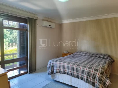 Casa com 4 Dormitórios - Miniatura - Lunardi Imóveis