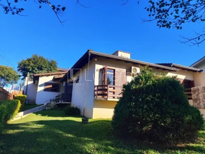 Casa com 4 Dormitórios - Lunardi Imóveis