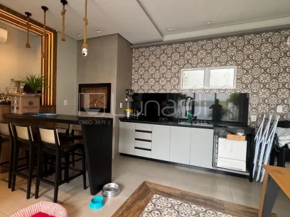 Casa com 4 Dormitórios - Miniatura - Lunardi Imóveis