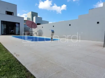 Casa com 4 Dormitórios - Miniatura - Lunardi Imóveis
