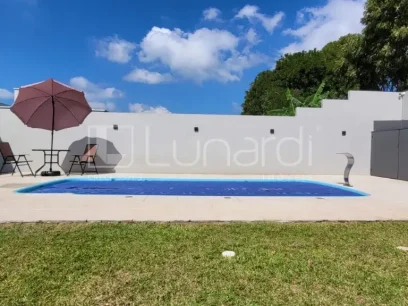 Casa com 4 Dormitórios - Miniatura - Lunardi Imóveis