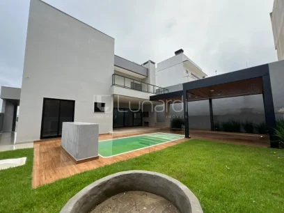 Casa com 4 Suítes - Miniatura - Lunardi Imóveis