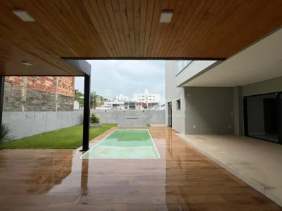 Casa com 4 Suítes - Miniatura - Lunardi Imóveis