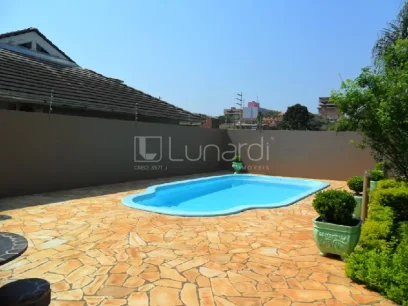 Casa com 3 Dormitórios - Miniatura - Lunardi Imóveis