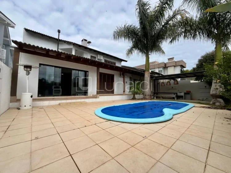 Casa com 4 Dormitórios - Lunardi Imóveis