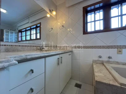 Casa com 4 Dormitórios - Miniatura - Lunardi Imóveis