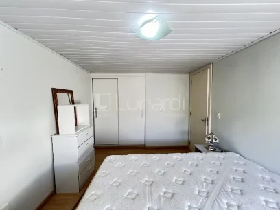 Casa com 4 Dormitórios - Miniatura - Lunardi Imóveis