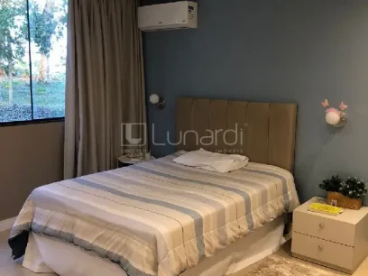 Casa com 4 Dormitórios - Miniatura - Lunardi Imóveis
