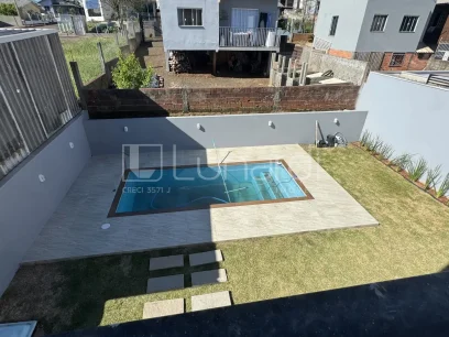 Casa com 3 Dormitórios - Miniatura - Lunardi Imóveis
