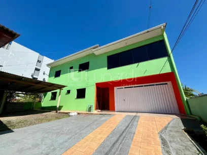 Casa com 4 Dormitórios - Lunardi Imóveis