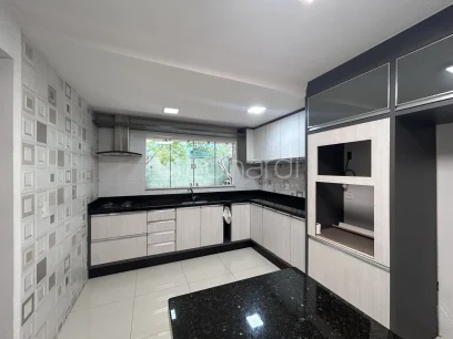 Casa com 4 Dormitórios - Miniatura - Lunardi Imóveis