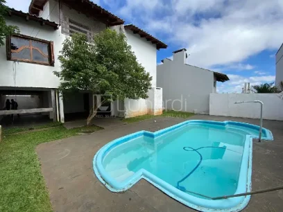 Casa com 4 Dormitórios - Miniatura - Lunardi Imóveis