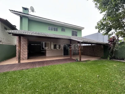 Casa com 4 Dormitórios - Miniatura - Lunardi Imóveis