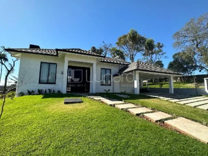 Casa com 4 Dormitórios - Lunardi Imóveis