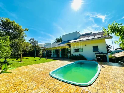 Casa com 4 Dormitórios - Lunardi Imóveis