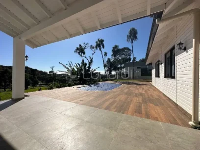 Casa com 4 Dormitórios - Miniatura - Lunardi Imóveis