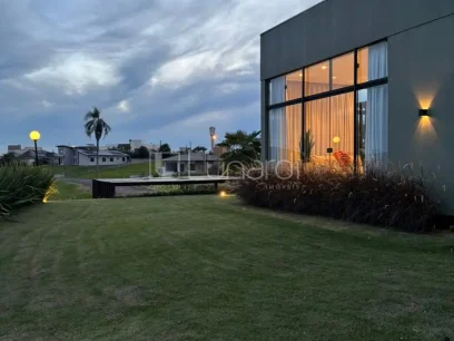 Casa com 4 Dormitórios - Miniatura - Lunardi Imóveis