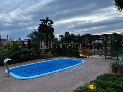 Casa com 4 Dormitórios - Miniatura - Lunardi Imóveis