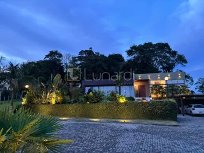 Casa com 4 Dormitórios - Miniatura - Lunardi Imóveis