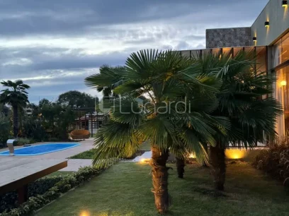 Casa com 4 Dormitórios - Miniatura - Lunardi Imóveis