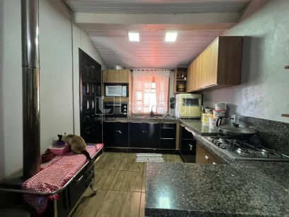 Casa com 3 Dormitórios - Miniatura - Lunardi Imóveis