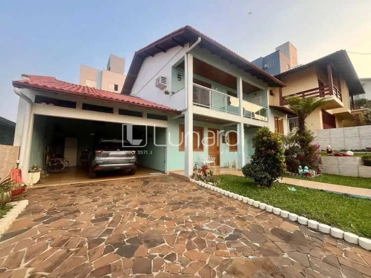 Casa com 4 Dormitórios - Lunardi Imóveis