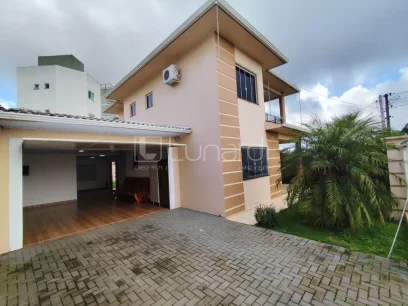 Casa com 3 Dormitórios - Miniatura - Lunardi Imóveis
