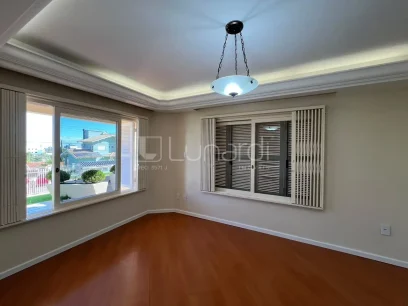 Casa com 4 Dormitórios - Miniatura - Lunardi Imóveis