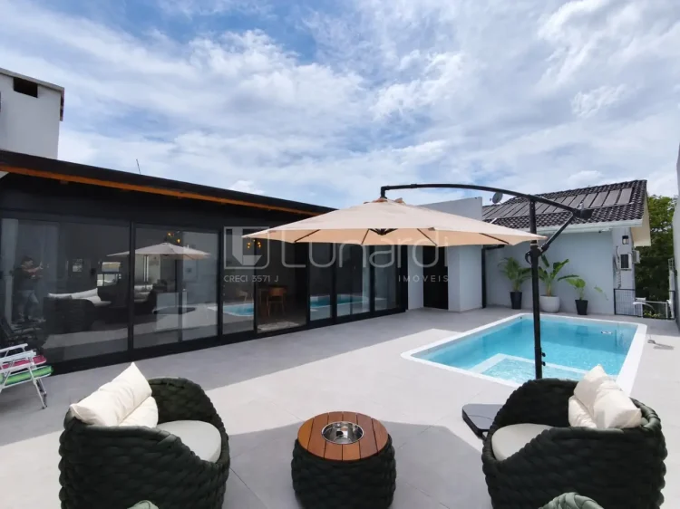 Casa com 4 Dormitórios - Lunardi Imóveis