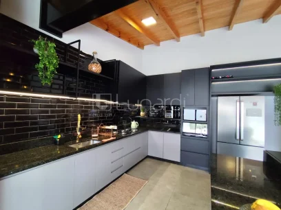 Casa com 4 Dormitórios - Miniatura - Lunardi Imóveis