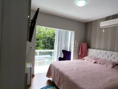 Casa com 4 Dormitórios - Miniatura - Lunardi Imóveis