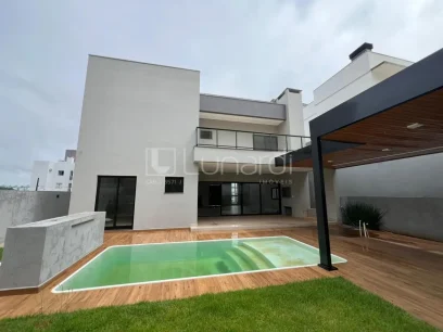Casa com 4 Suítes - Miniatura - Lunardi Imóveis