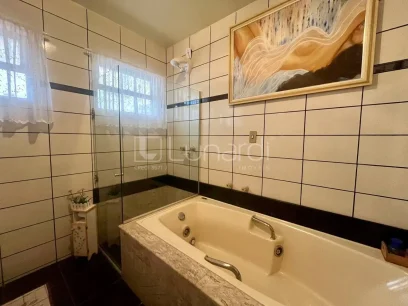 Casa com 4 Dormitórios - Miniatura - Lunardi Imóveis