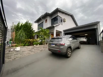 Casa com 3 Suítes - Lunardi Imóveis