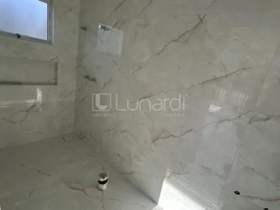 Casa com 4 Dormitórios - Miniatura - Lunardi Imóveis